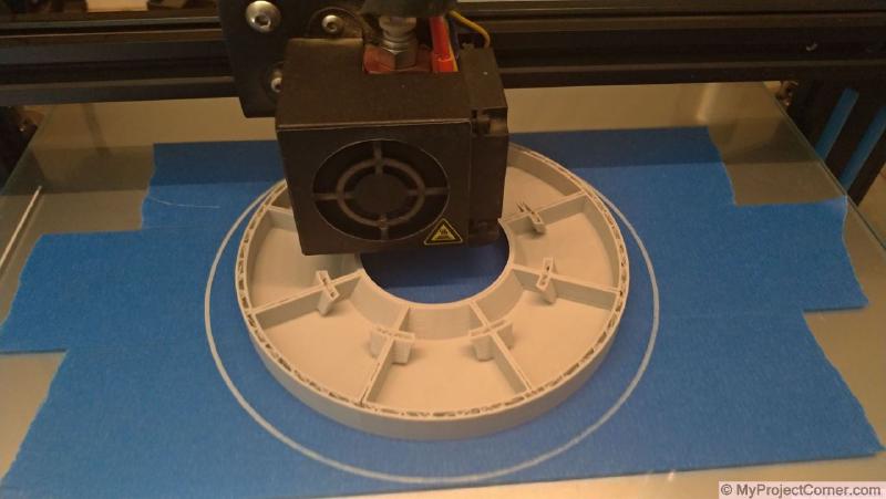 The chicken feeder for PVC pipe being printed on a CR10-s printer