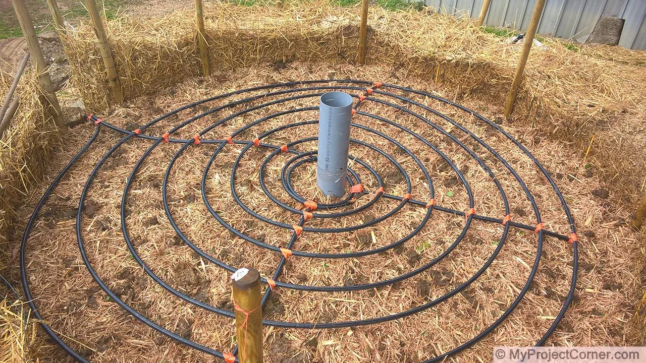 Construyendo las capas para el sistema de calentamiento del compost