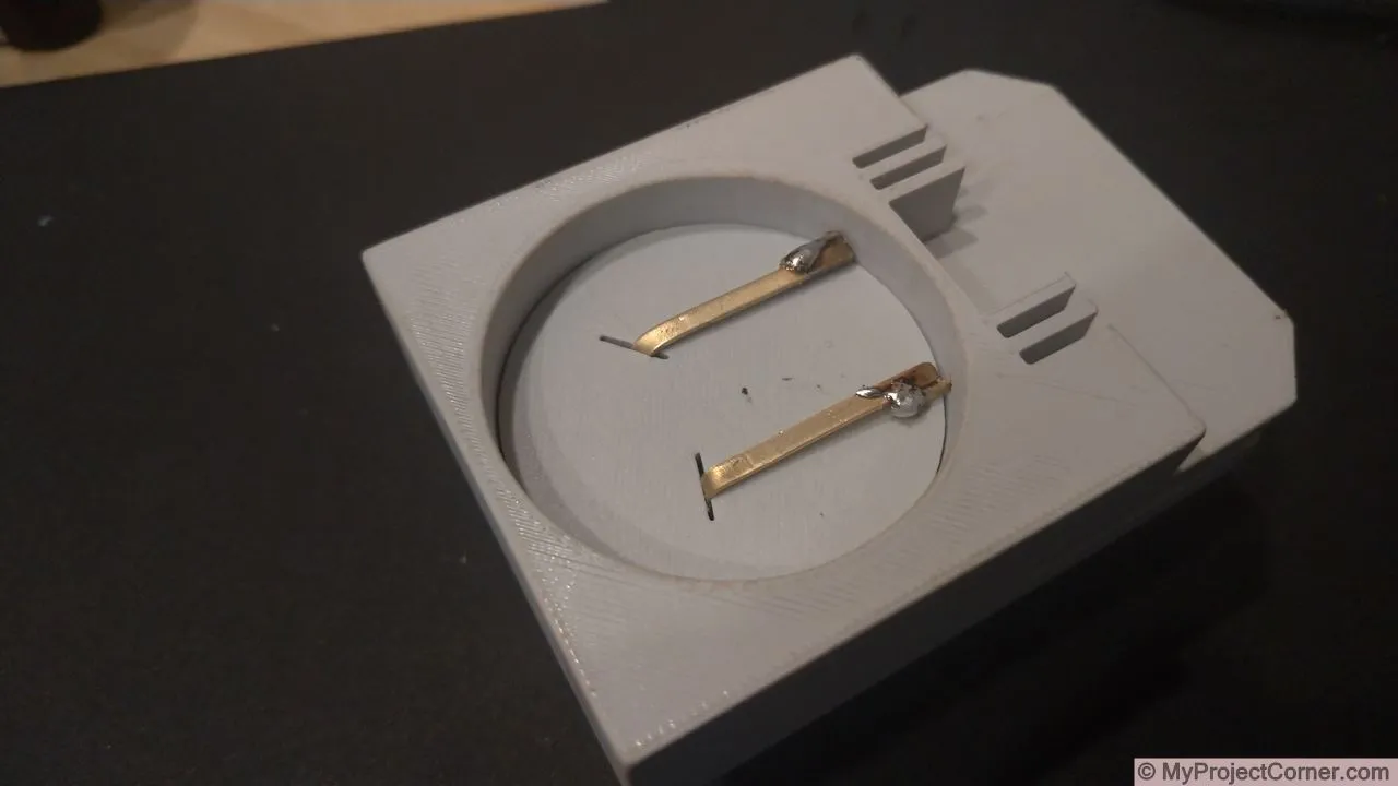 conectando y soldando los terminales de la batería