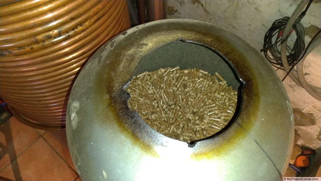 wood pellets in rocket stove hopper