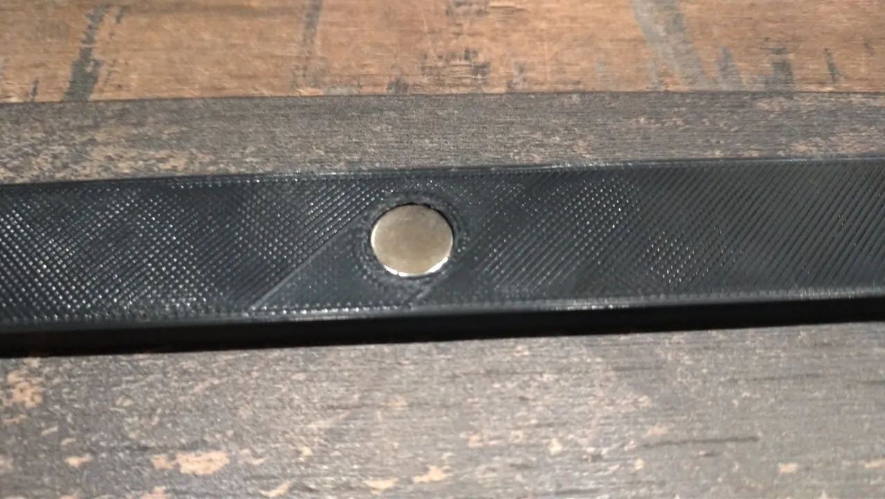 insérer les aimants à l'aide d'une spatule