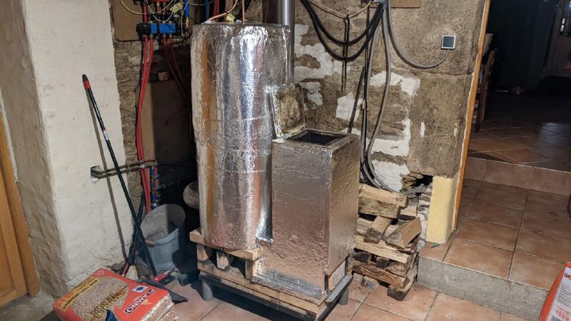 adding insulating to the rocket stove
