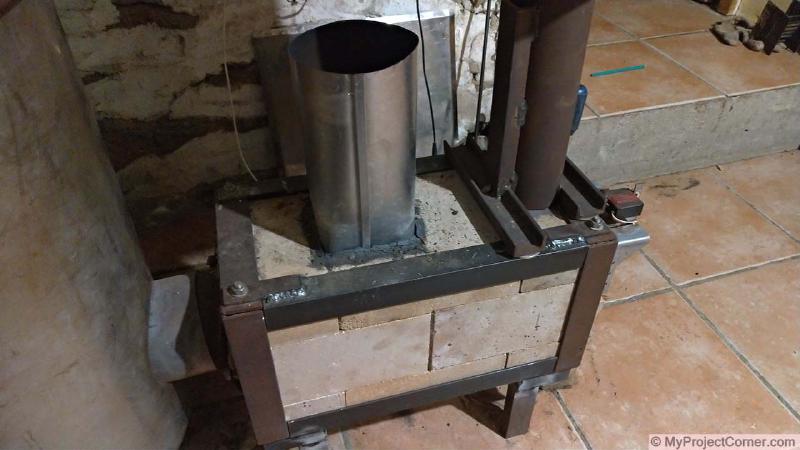 Pellet stove dual fuel modification with temporary feed pipe