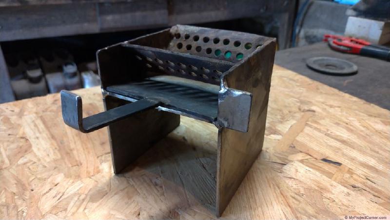 pellet rocket stove combustion chamber three